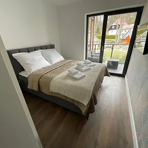 https://apartament-szklarski-widok.szklarskaporebahotels.net